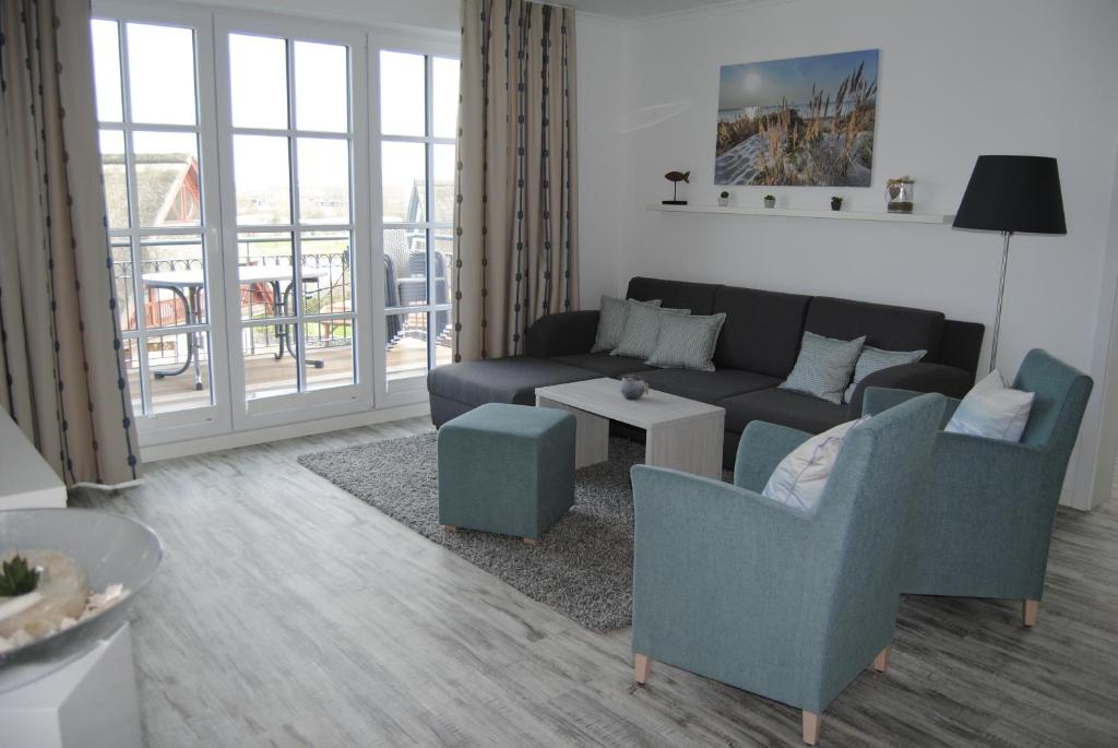 Posezení v ubytování Dünenrose Apartment 7