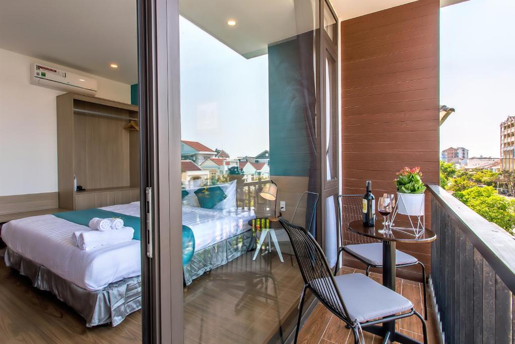 Un balcón o terraza de Square Villa Hoi An
