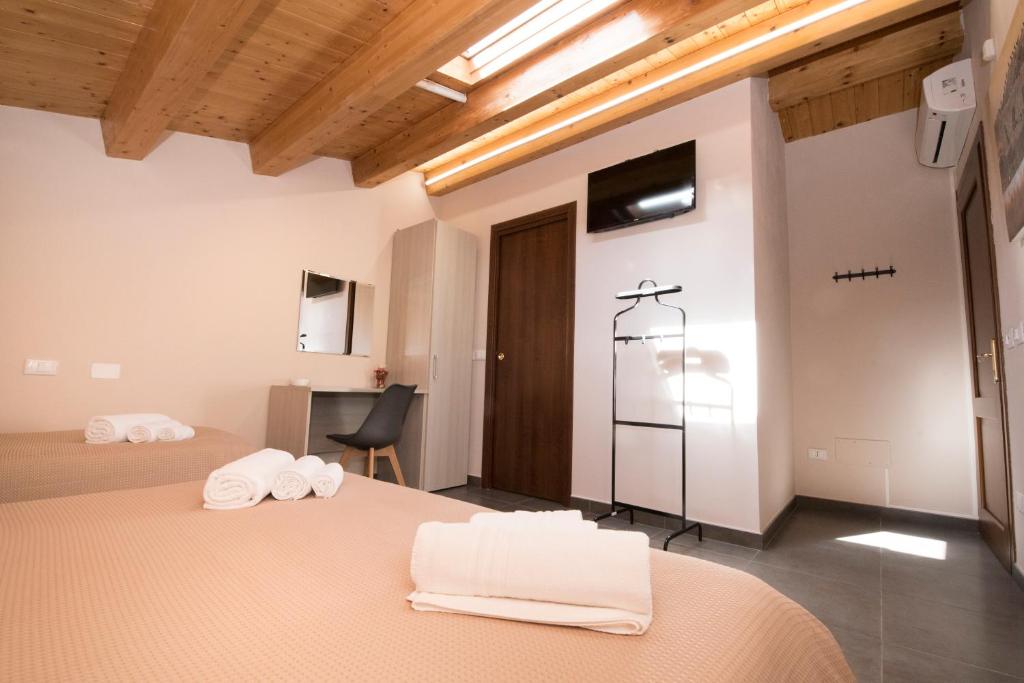 Postel nebo postele na pokoji v ubytování Casa Malaclà B&B