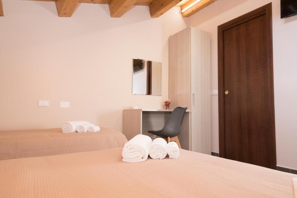 Postel nebo postele na pokoji v ubytování Casa Malaclà B&B