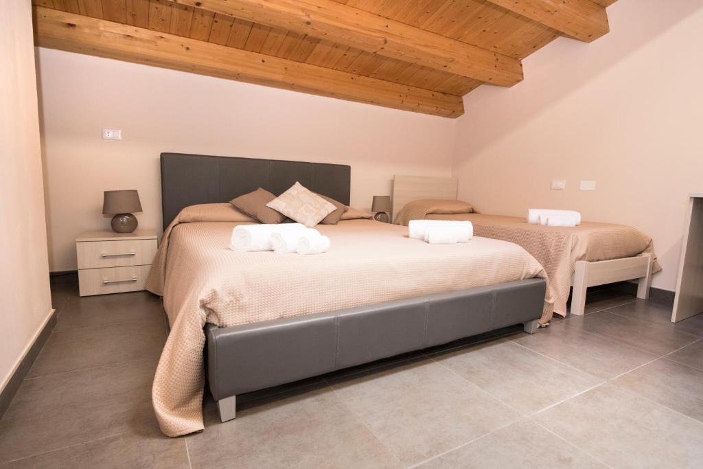 Postel nebo postele na pokoji v ubytování Casa Malaclà B&B