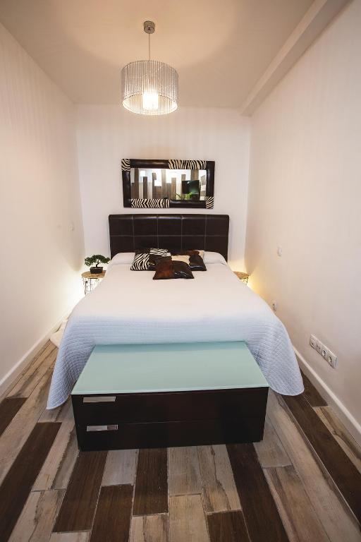 Posteľ alebo postele v izbe v ubytovaní Junior Suites con Jacuzzi