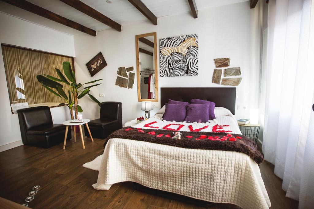 Posteľ alebo postele v izbe v ubytovaní Junior Suites con Jacuzzi