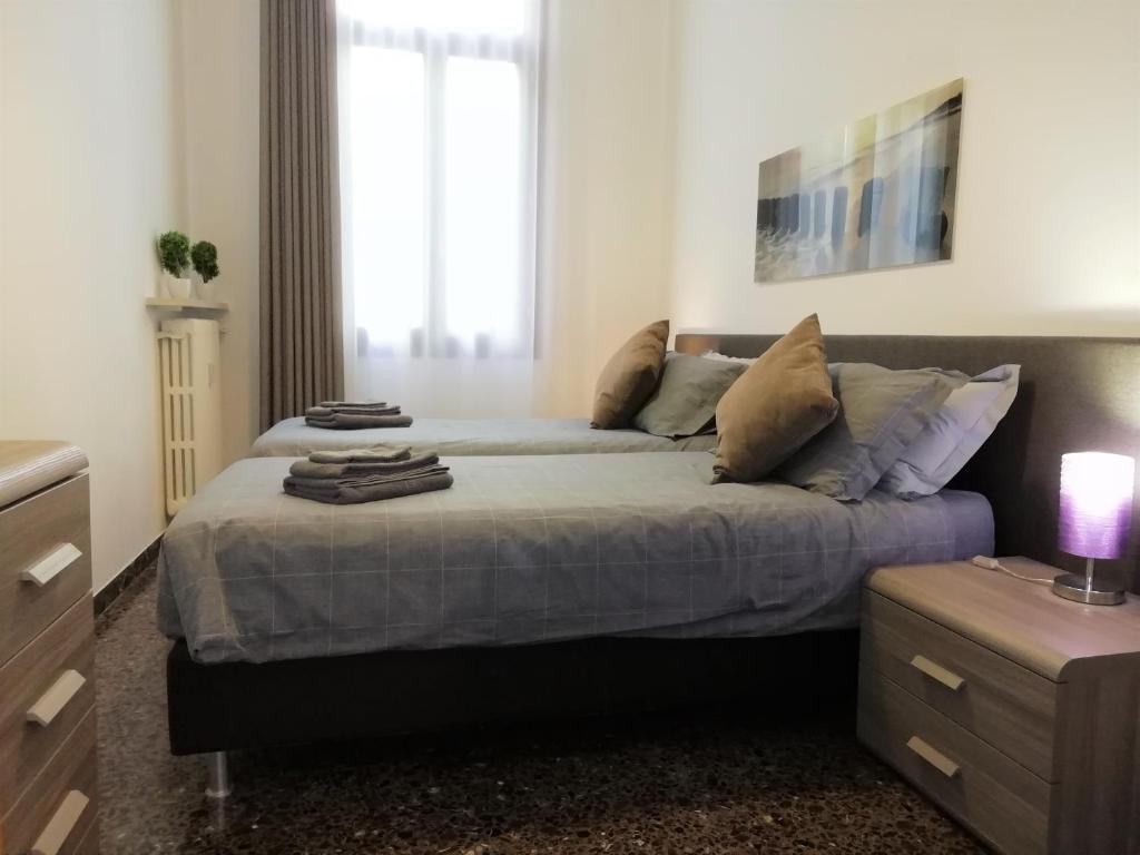 Łóżko lub łóżka w pokoju w obiekcie Cà Mocenigo Nobile