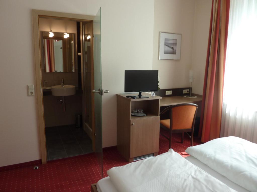TV a/nebo společenská místnost v ubytování Hotel Gasthof König Karl