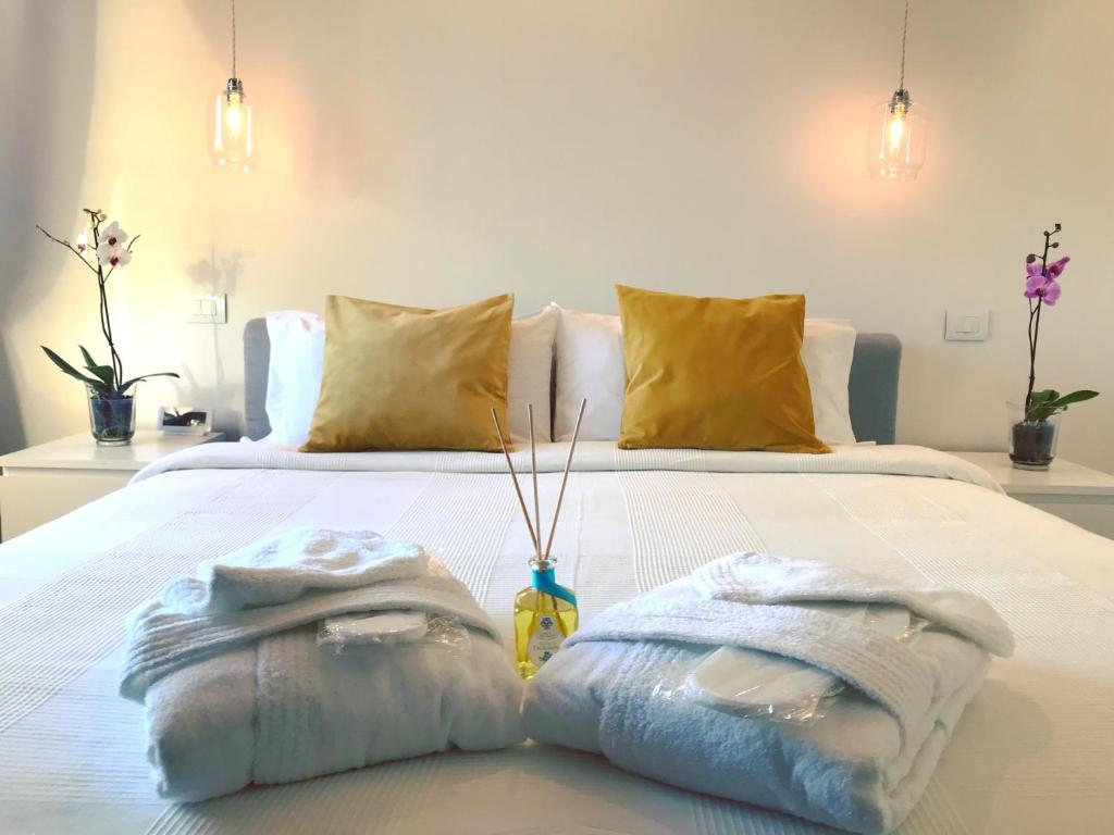 מיטה או מיטות בחדר ב-Villa Greta Hotel Rooms & Suites