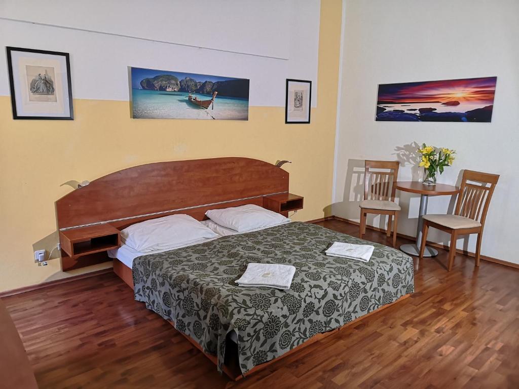 Postel nebo postele na pokoji v ubytování Auspicie Apartment