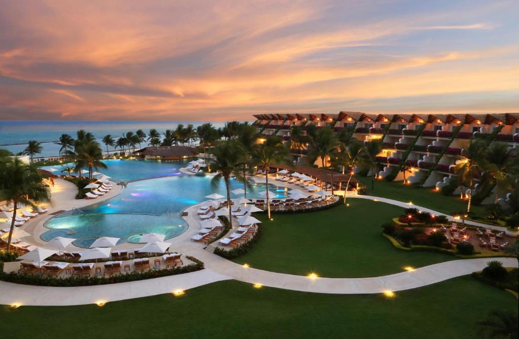 an aerial view of a resort with a pool at Grand Velas Riviera Maya - All Inclusive in Playa del Carmen