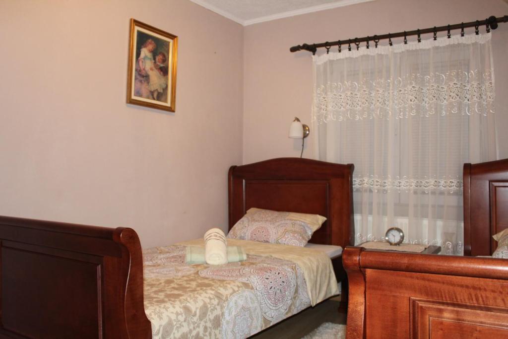 Postel nebo postele na pokoji v ubytování Apartment Home Popovic