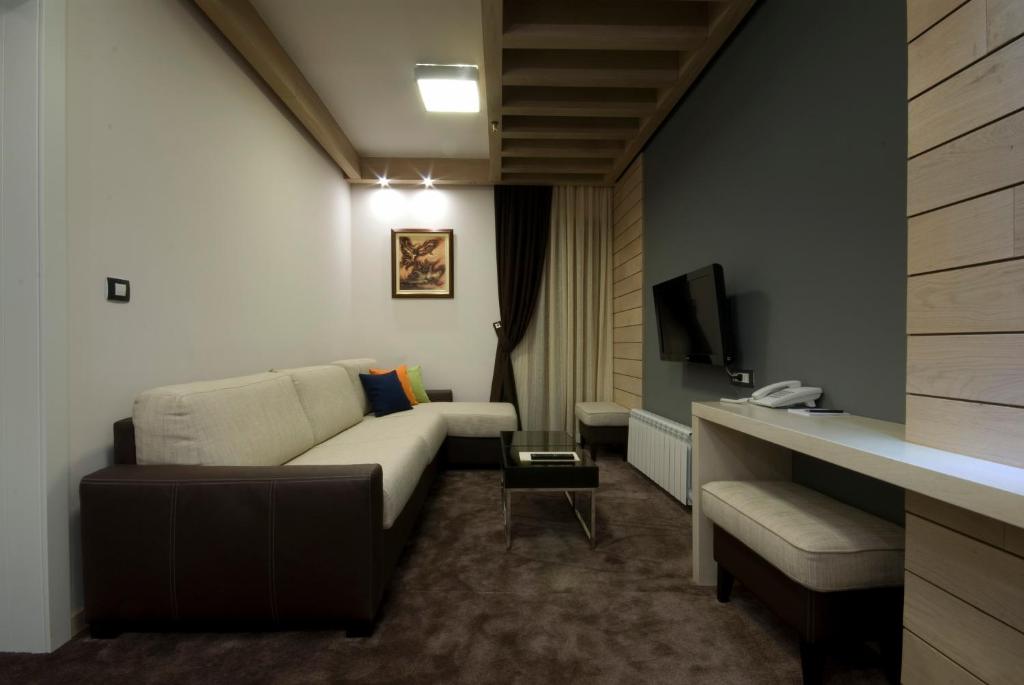 TV i/ili multimedijalni sistem u objektu Hotel Soa