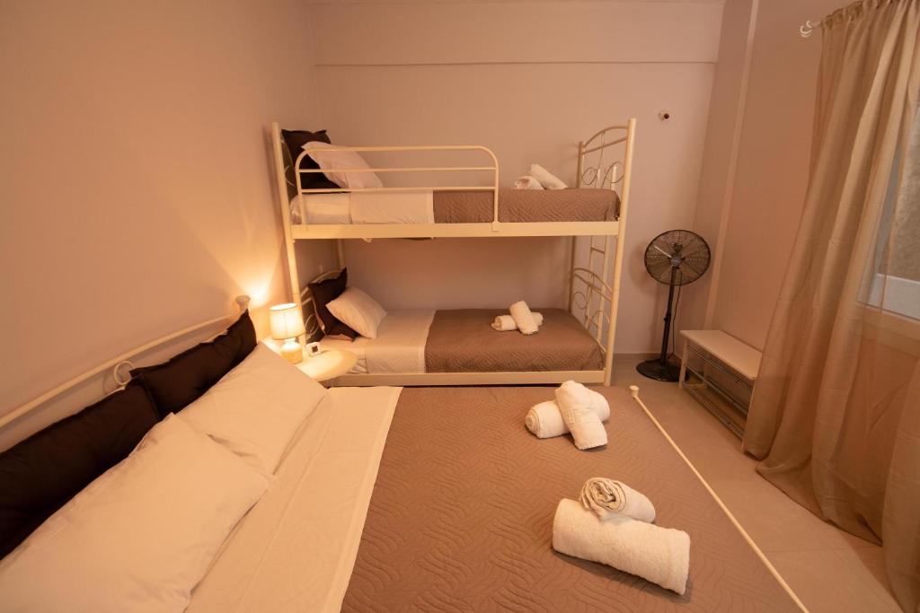 A bed or beds in a room at Seaside Apartments-Cristina