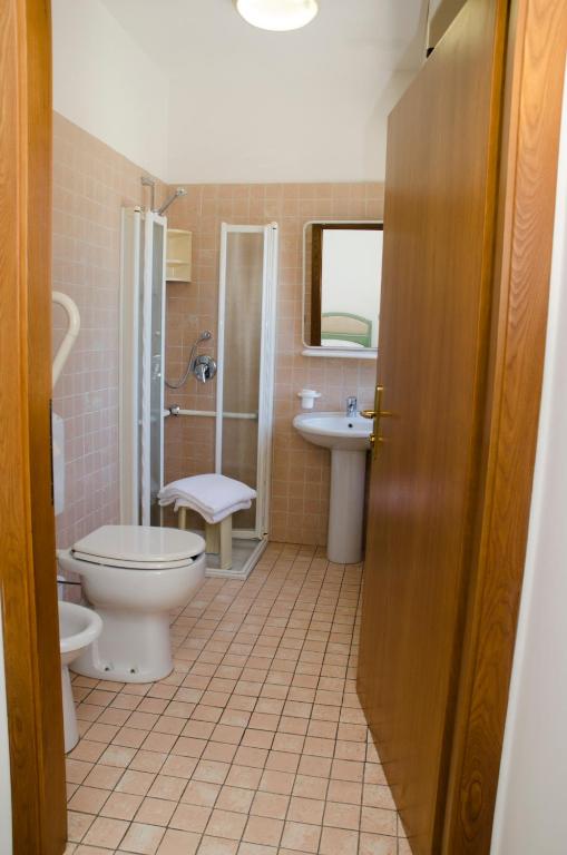 Koupelna v ubytování Albergo Cenni