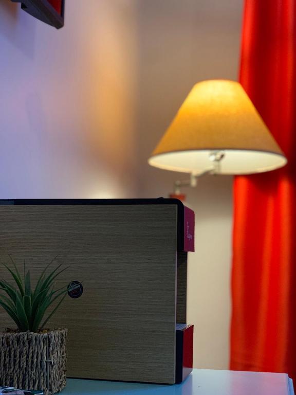 TV a/nebo společenská místnost v ubytování Vila De Argint Aleea Pelesului Nr 2