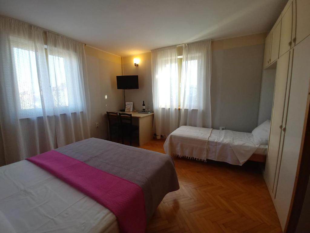 Postel nebo postele na pokoji v ubytování Room BM