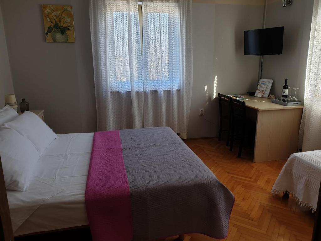 Postel nebo postele na pokoji v ubytování Room BM