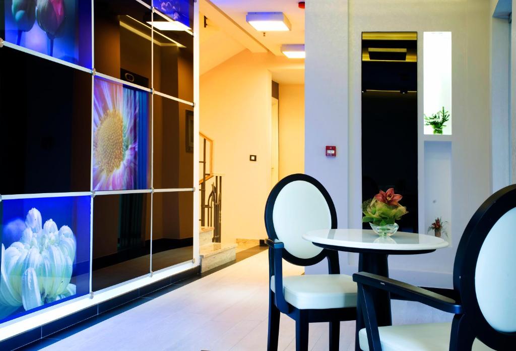TV i/ili multimedijalni sistem u objektu Hotel Soa