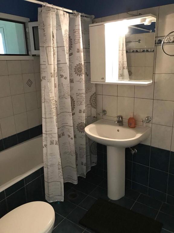Koupelna v ubytování Nonika’s House