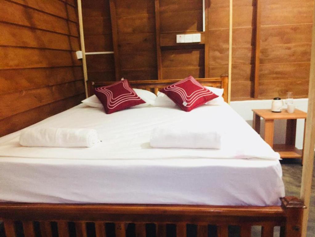 Postel nebo postele na pokoji v ubytování De Perla Resort