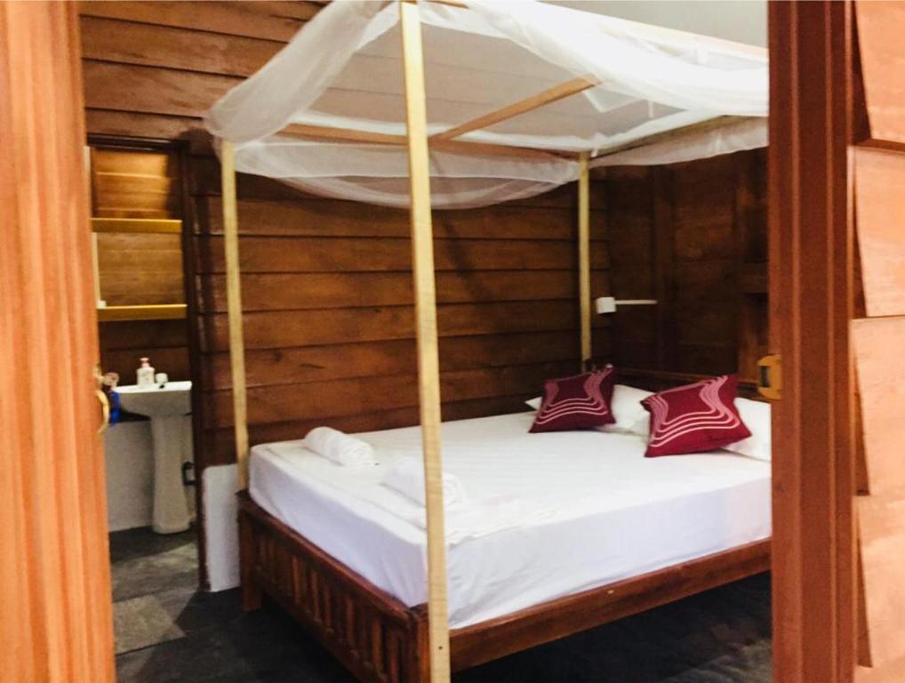 Postel nebo postele na pokoji v ubytování De Perla Resort