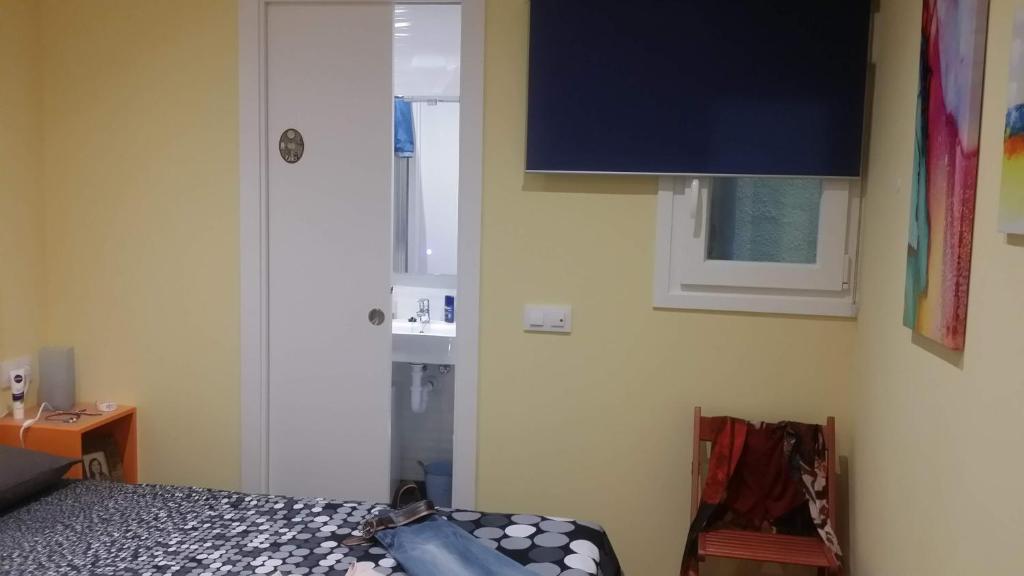 Posteľ alebo postele v izbe v ubytovaní Apartamentos Ferrán Paqui