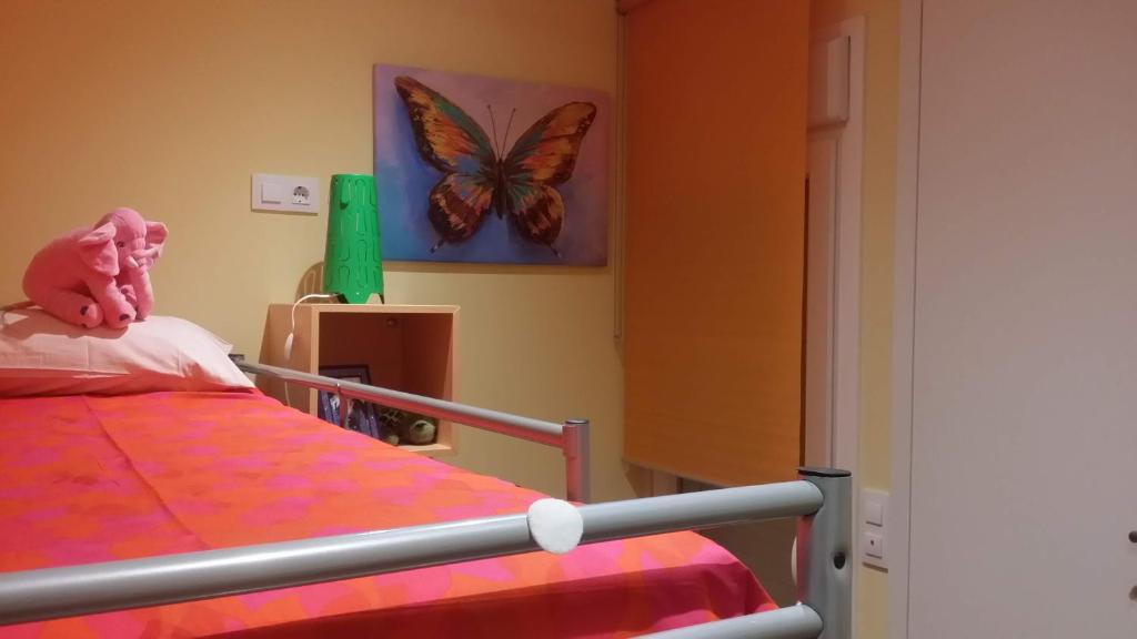 Posteľ alebo postele v izbe v ubytovaní Apartamentos Ferrán Paqui