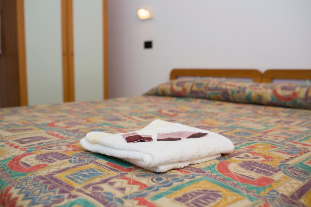 Postel nebo postele na pokoji v ubytování Albergo Villa Marchese