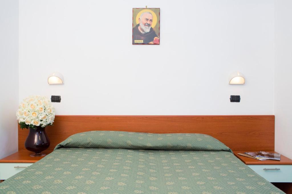 Postel nebo postele na pokoji v ubytování Albergo Villa Marchese
