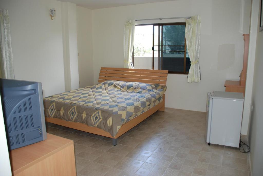 Postel nebo postele na pokoji v ubytování TK Guesthouse