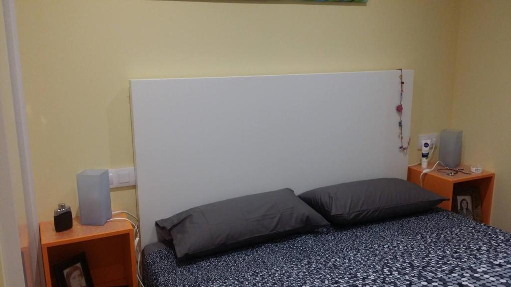 Posteľ alebo postele v izbe v ubytovaní Apartamentos Ferrán Paqui