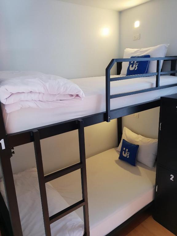 Postel nebo postele na pokoji v ubytování Us hostel samui