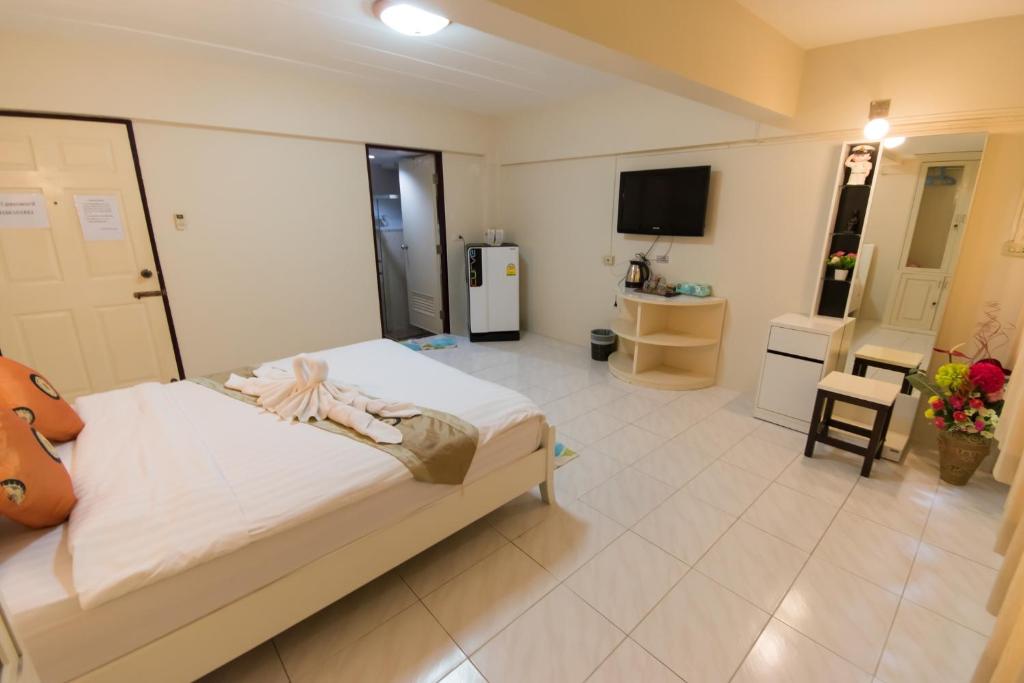 Postel nebo postele na pokoji v ubytování Maria Room HuaHin