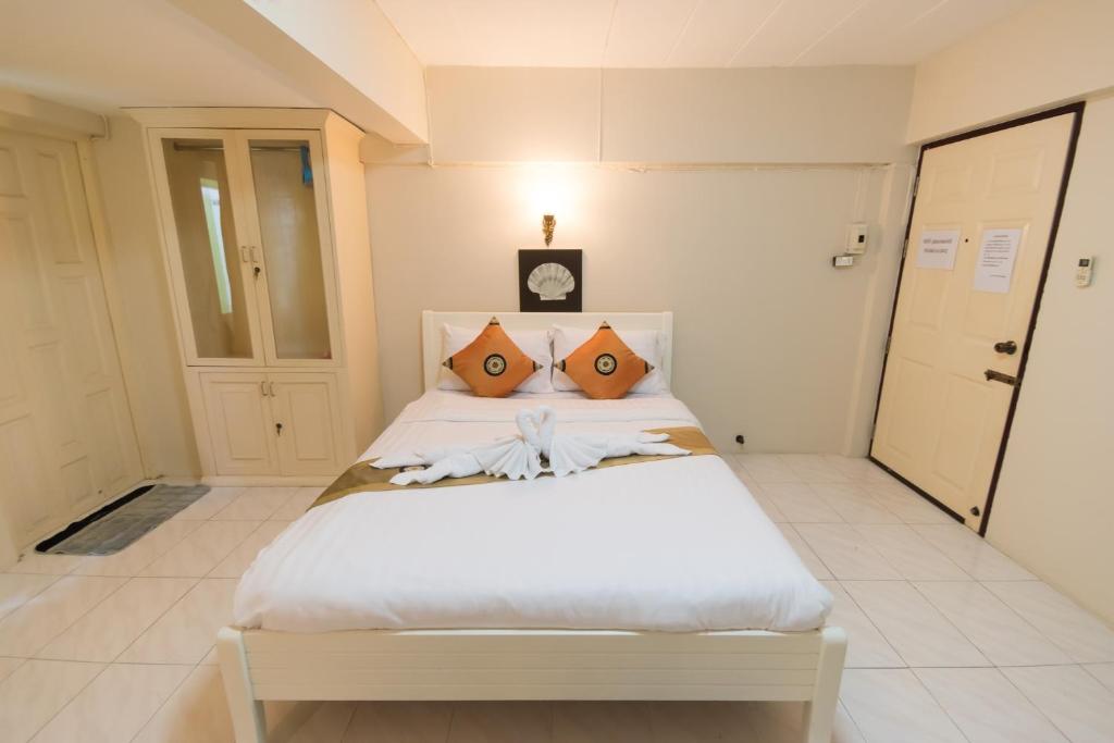 Postel nebo postele na pokoji v ubytování Maria Room HuaHin