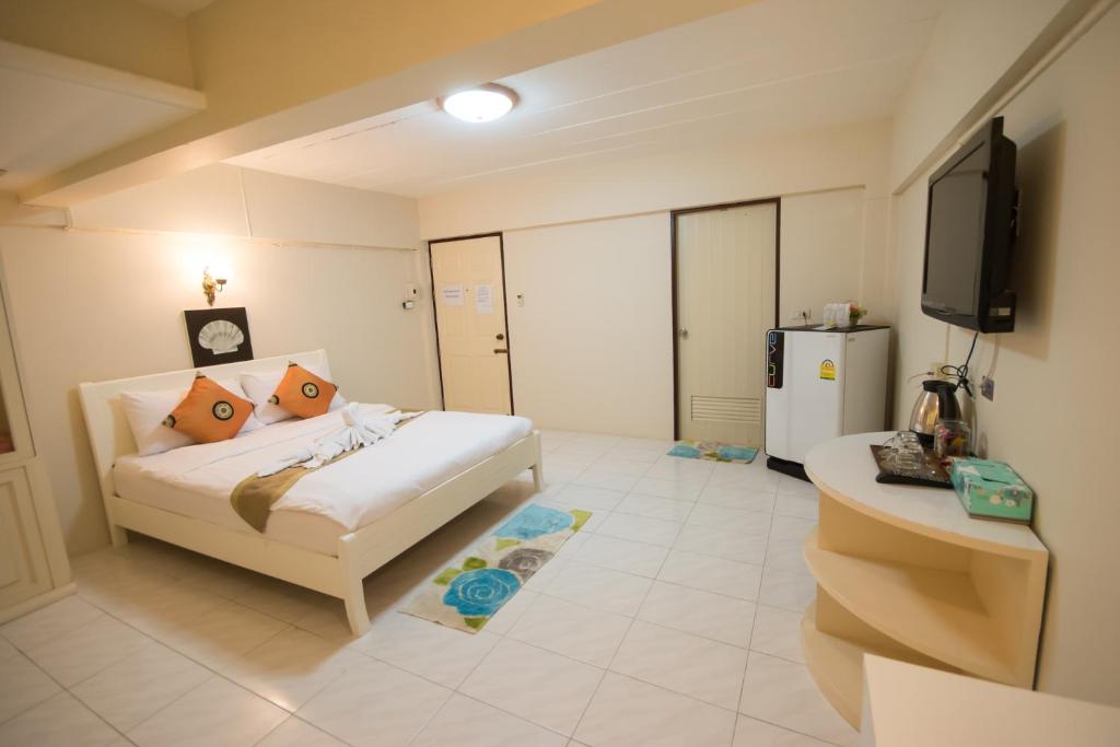 Postel nebo postele na pokoji v ubytování Maria Room HuaHin