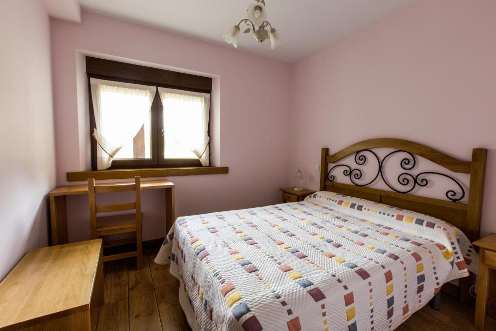 Cama o camas de una habitación en La Dobra de liebana