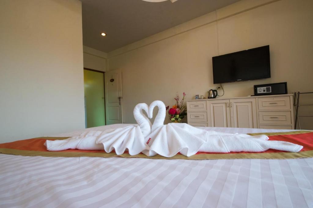 Postel nebo postele na pokoji v ubytování Maria Room HuaHin