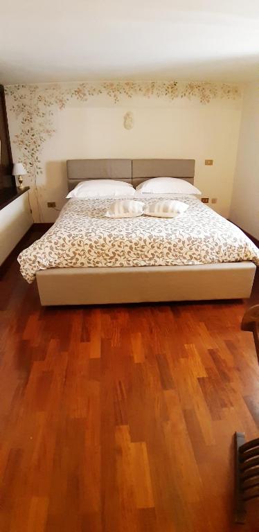 A bed or beds in a room at Casa de Spuches