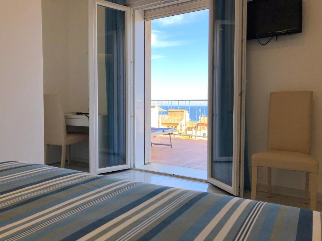 Postel nebo postele na pokoji v ubytování Hotel Bahamas