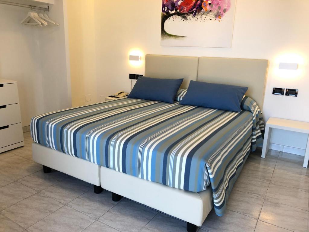 Postel nebo postele na pokoji v ubytování Hotel Bahamas