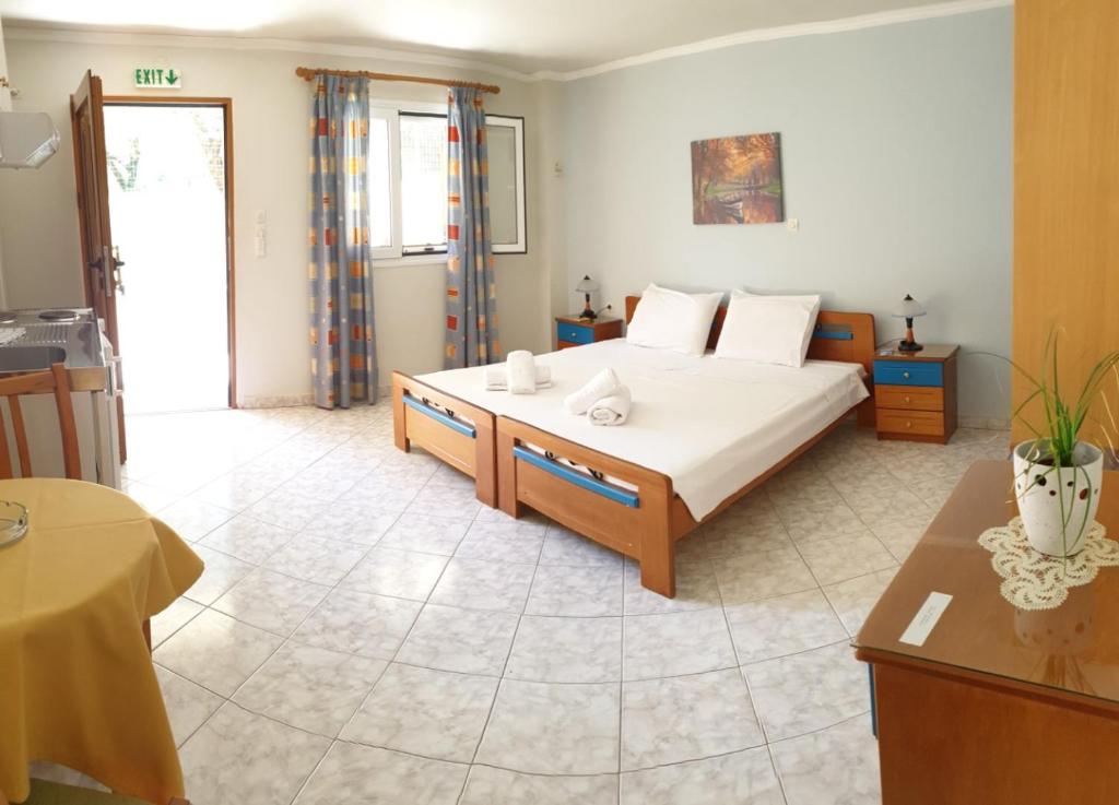 Postel nebo postele na pokoji v ubytování Epi Apartments