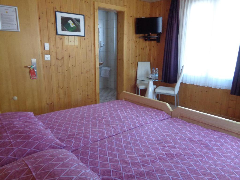 Postel nebo postele na pokoji v ubytování B&B Eischoll
