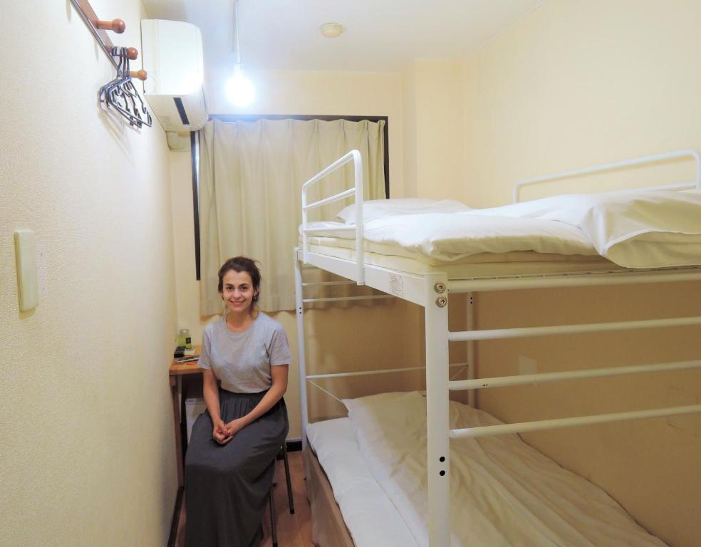 Postel nebo postele na pokoji v ubytování Hotel Lucky