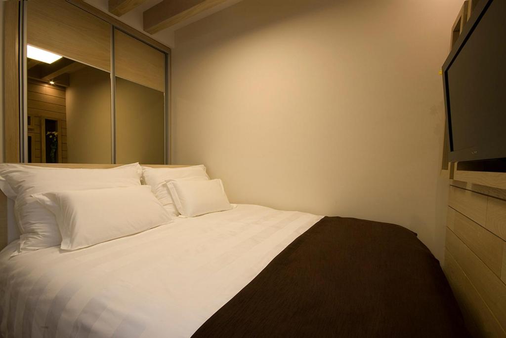 Krevet ili kreveti u jedinici u okviru objekta Hotel Soa