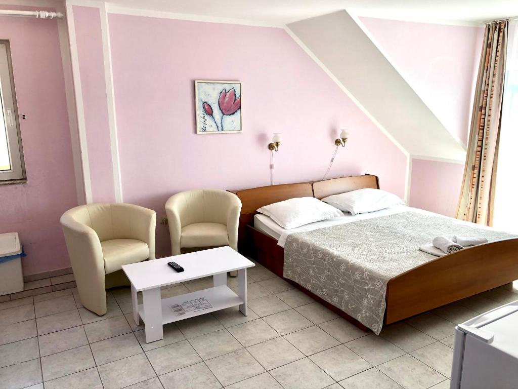 Postel nebo postele na pokoji v ubytování Pansion Begic