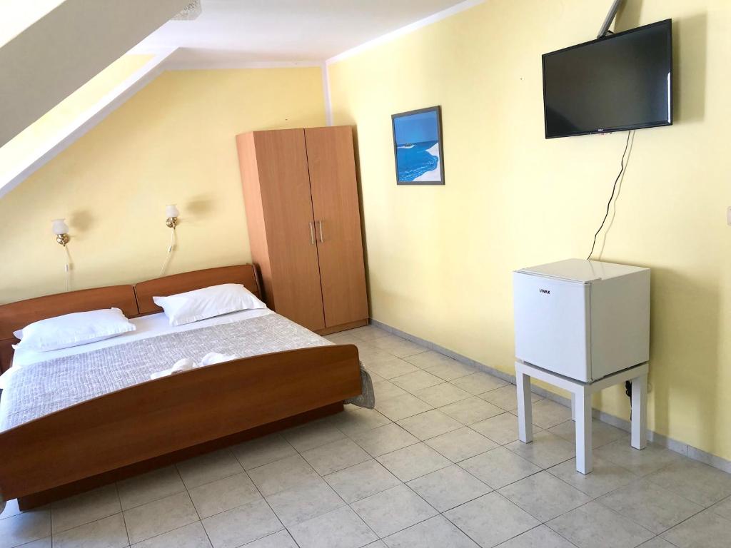 TV a/nebo společenská místnost v ubytování Pansion Begic