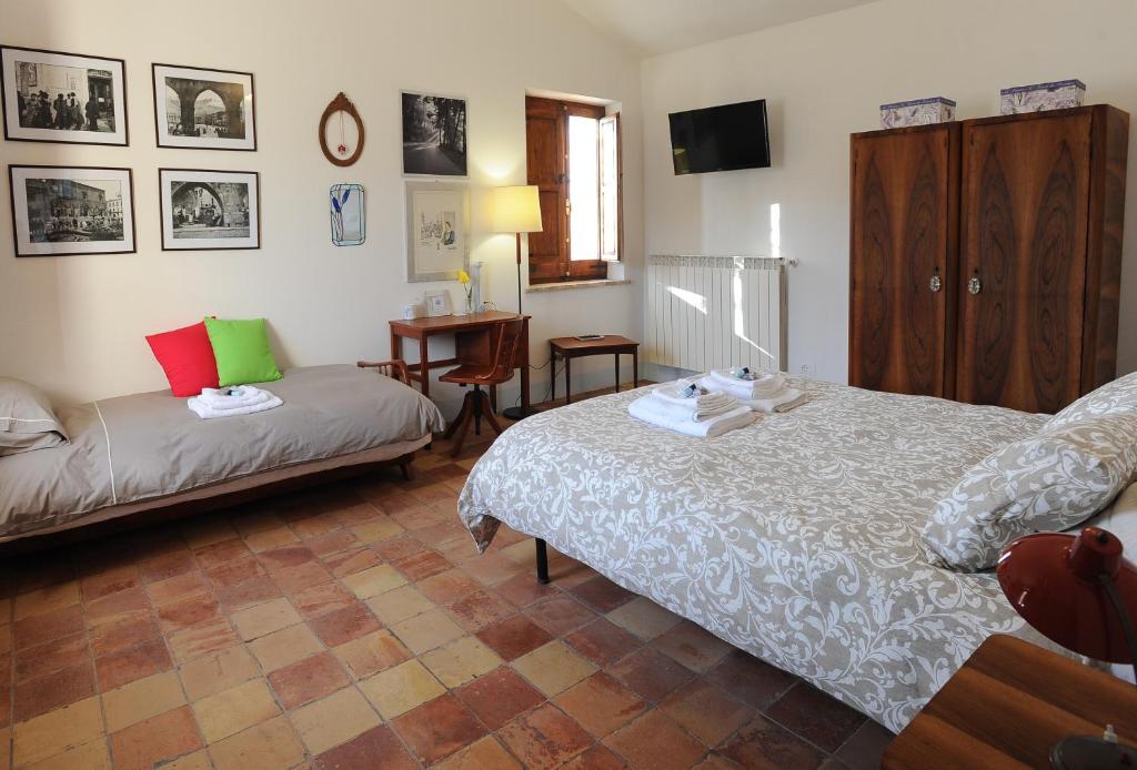 Postel nebo postele na pokoji v ubytování B&B Conca Del Pretore