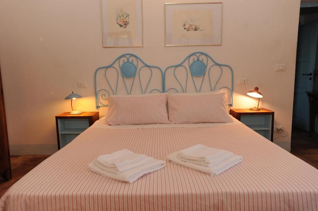 Postel nebo postele na pokoji v ubytování B&B Conca Del Pretore