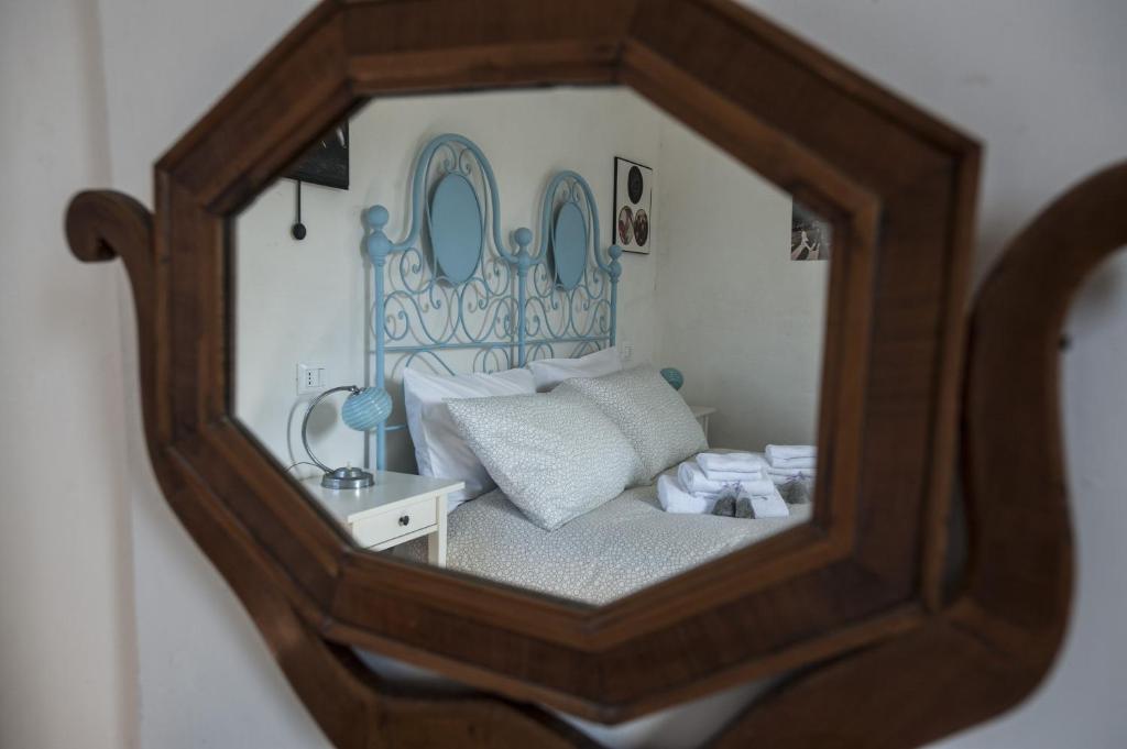 Postel nebo postele na pokoji v ubytování B&B Conca Del Pretore