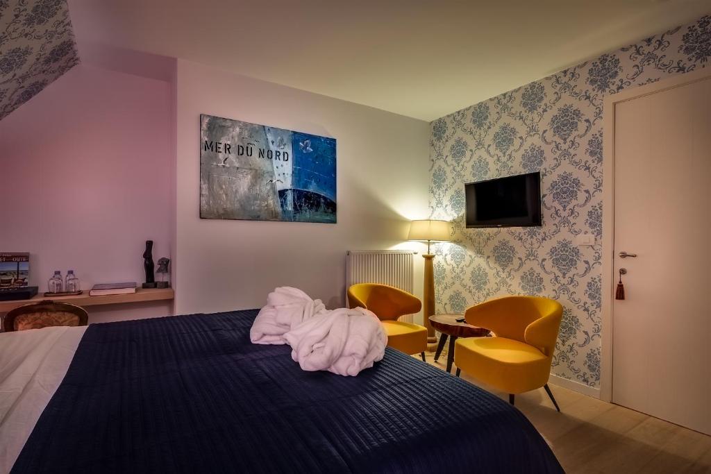 Postel nebo postele na pokoji v ubytování B&B Maison seki