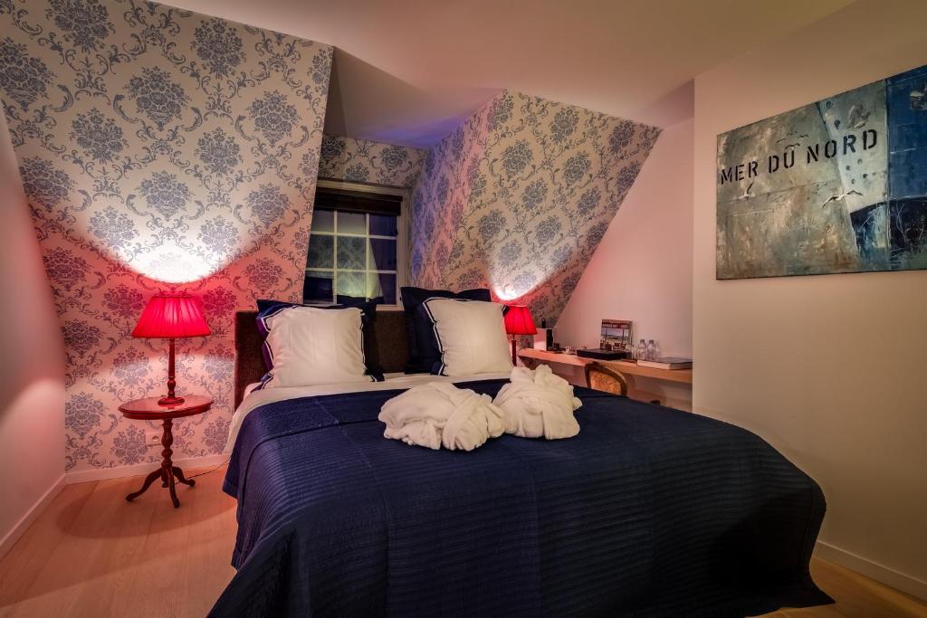 Postel nebo postele na pokoji v ubytování B&B Maison seki