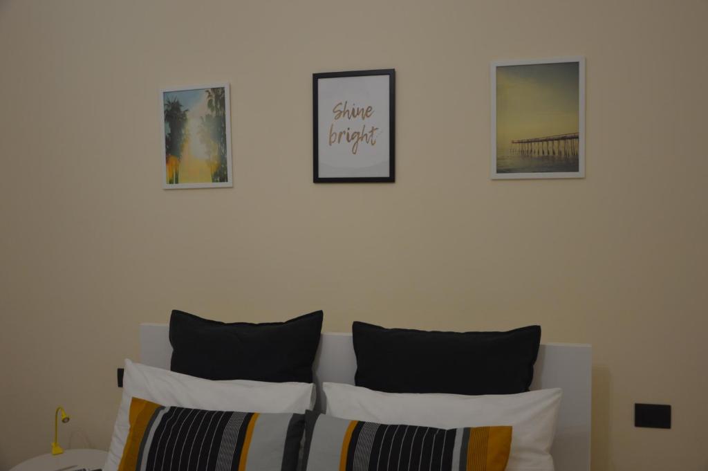 A bed or beds in a room at Catania Sun&Sea - Sun Home